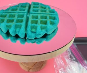 Want the perfect birthday breakfast? Check out this awesome waffle maker layered rainbow cake that is super easy to make and won't heat up the kitchen!