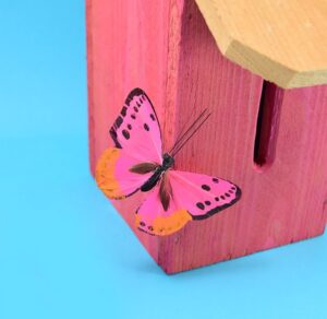 Grab a cedar picket to make a lovely and simple DIY butterfly house. This budget-friendly project works out to only $3 in lumber apiece!