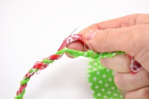 Learn how to turn your scrap material into simple and adorable fabric twine. Make something cute and bust your craft stash at the same time!