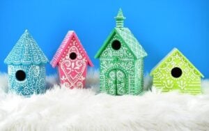 This is genius! these faux gingerbread birdhouses are cute, glittery and can be stored and pulled out for my Christmas decor next year!