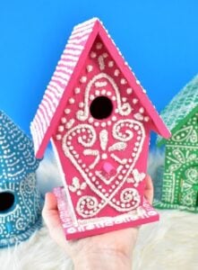 This is genius! these faux gingerbread birdhouses are cute, glittery and can be stored and pulled out for my Christmas decor next year!