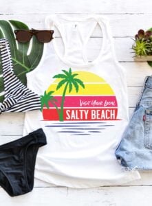With a cool vintage vibe, this Visit Your Local Salty Beach tee shirt is sure to be a hot new staple to your summer wardrobe. Get the free SVG file to make your own!