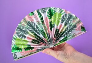 Turn pretty cardstock into gorgeous and super effective folded paper fans that are great to tuck in your purse for those hot days!