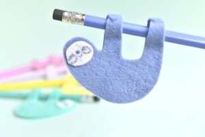 Adorable back to school kid craft pencil sloths by Handmade Charlotte.