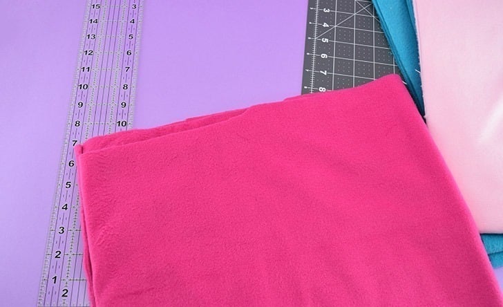 You'll need approximately 2 yards of fleece fabric to make a DIY snuffle mat.