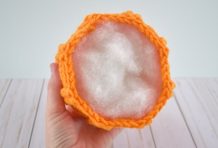 Flip the pumpkin body over and stuff with Polyfil.