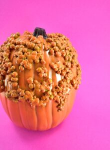 Make this faux warty pumpkin with easy to follow photo instruction. You won't believe how easy it is to turn a fake pumpkin into a knucklehead pumpkin!