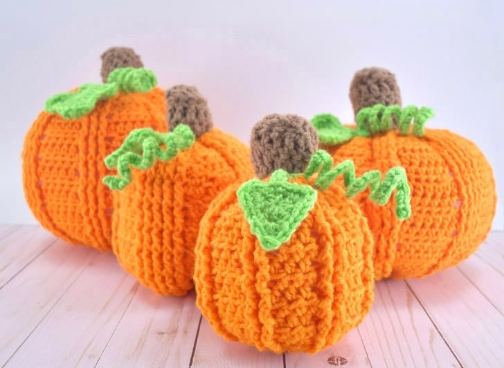 Whip up some adorable crochet pumpkins with this free pattern with FOUR different variations! Easy to follow photo tutorial for assembly, too!