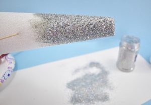 Apply a thick coat of acrylic paint to your styrofoam horn, working in small areas at a time.
