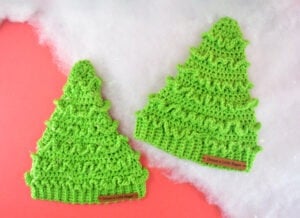 Looking for an adorable crochet hat to keep heads warm and celebrate the Christmas season? Get this adorable, FREE Christmast Tree Hat Crochet Pattern!