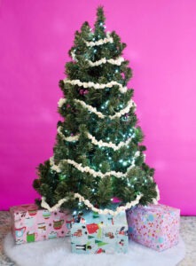 A surprising supply from the hardware store makes the most perfect fake popcorn garland. DIY a little bit of tradition that will last for years!