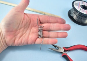 Remove the coil from the dowel and stretch out slightly.