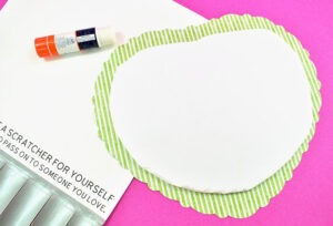 Cut a piece of inexpensive foam core board to a similar shape and size of your heart.