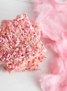 If you love cotton candy you're in for a real treat, a rice krispie treat! Easily made gluten free, these pink sweet treats are sure to please!
