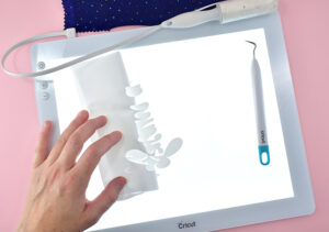 Cut and weed your Iron-On with the Dream a Little Bigger saying or design of your choice.