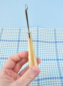 The latch hook tool is inexpensive and found at craft stores.