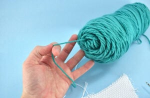 Pull your thread from the center of your skein if possible. This will help prevent some tension problems as you punch.