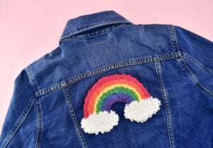 Looking for a fun and easy embroidery pattern? Get this rainbow punch needle pattern and stick around to learn how to turn it into a rainbow applique!