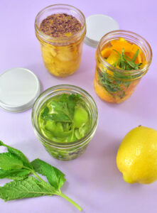 Once your jars are full screw on a lid until finger tight. Place the jars in a cool dark place like in a cabinet and allow to rest.