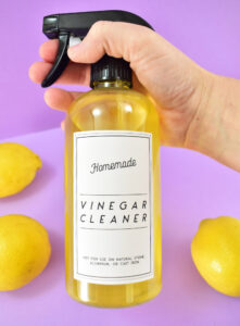 Don't like the smell of vinegar? Neither do I! Make this deliciously citrus-scented homemade vinegar cleaner and grab some free printable labels for it!