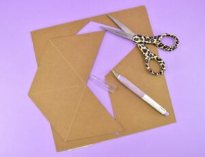 Sometimes the cut might not go all of the way through the chipboard in some areas. Use a sharp craft knife to finish the cut. Pop the piece out of the chipboard.