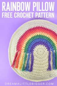 Looking for a fun, colorful, and fringed DIY addition to your decor? Get the free pattern and hook up this round crochet rainbow pillow!