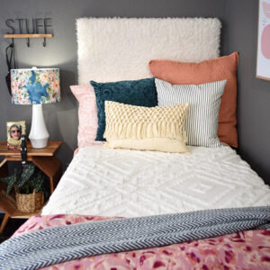 This DIY furry headboard is super easy to make and so comfy to rest against. Add some fun bohemian flair to your bed with a faux fur headboard!