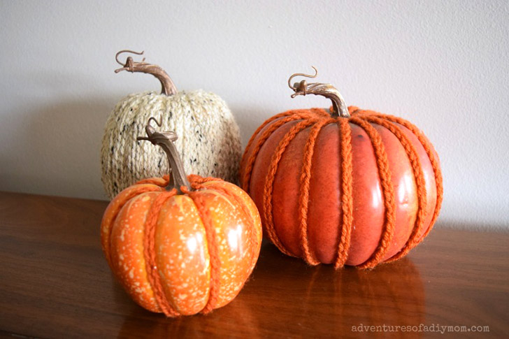 We love these 20+ knit, crochet, loom knit, and otherwise DIY yarn pumpkins you are going to want to craft up this fall!