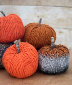 We love these 20+ knit, crochet, loom knit, and otherwise DIY yarn pumpkins you are going to want to craft up this fall!