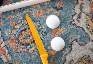 Cut a 2.8" inch styrofoam ball in half.