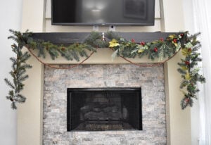 See how to make gorgeous and professional-looking DIY Christmas garland, step by step, without a huge budget.