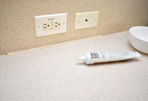 How to apply new caulk.