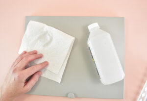 Clean the metal with rubbing alcohol and a clean paper towel or microfiber rag. Allow to completely dry.