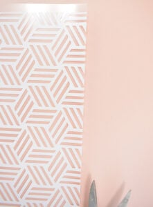 Trim the center piece as closely to the edge of the design as possible with scissors. Center and place inside of the frame on the metal (there should be no overlapping carrier sheet).