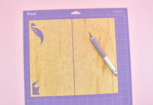 Load the mat into your Cricut Maker and cut the design from this Cricut Design Space File using the veneer settings.