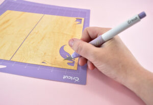 If necessary, use a craft knife, like the Cricut TrueControl to help remove pieces that don't easily come away.