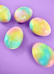 I love these rainbow dyed Easter eggs because they are gorgeous and do not require a lot of effort or expense. See how to make your own gorgeous rainbow Easter eggs covered in gorgeous swirls of color.