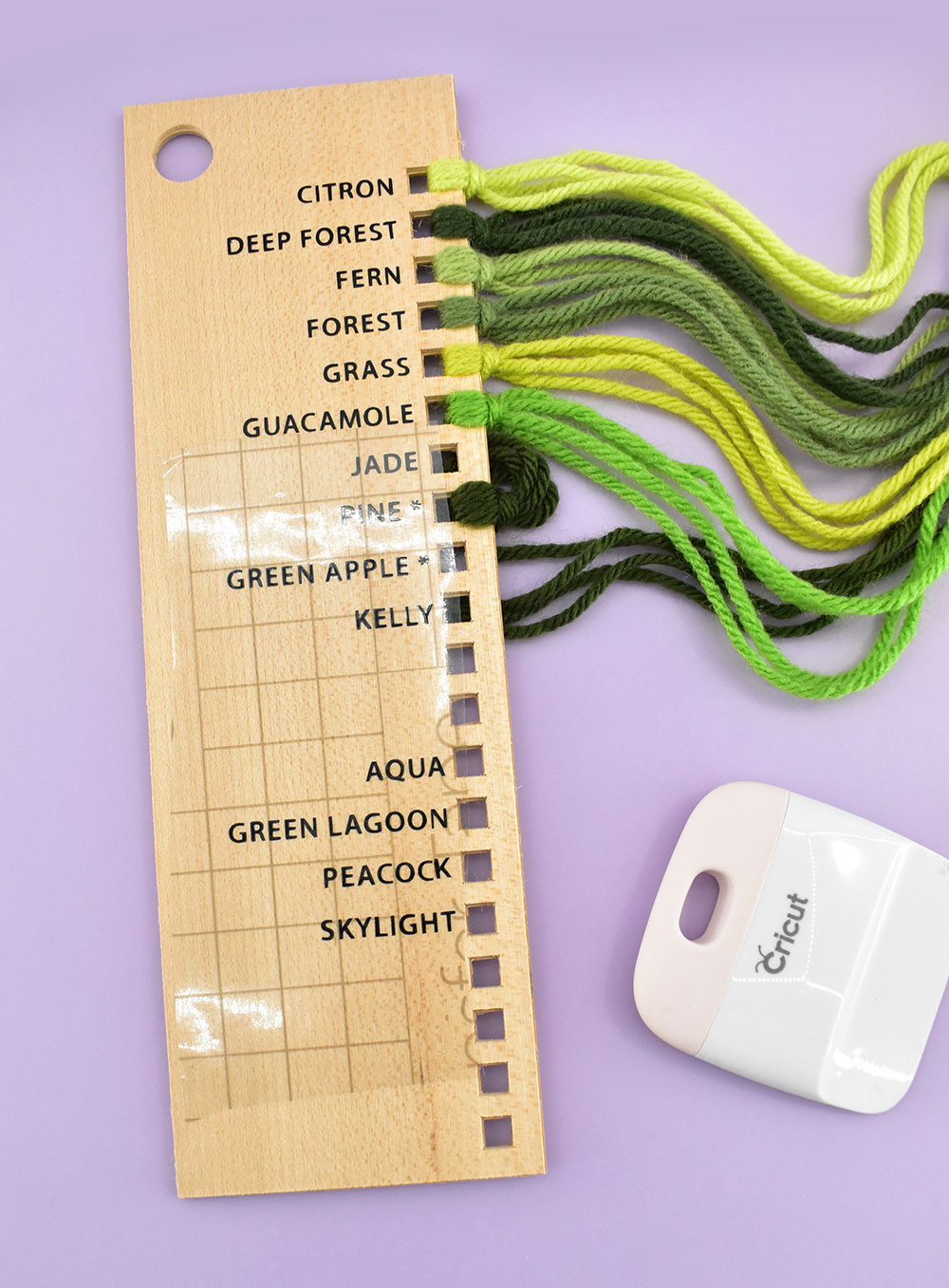 If your yarn stash grows or if you just forgot to add all of your color names the first time (like I did!) no worries... Adding colors to the card is super easy. Cut out the name(s) you need to add out of permanent vinyl (this is seriously one of those times the Cricut Joy was really made for!). Use transfer tape just like you did in the beginning to add the colors to the card.
