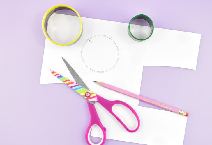 Using a thicker piece of paper, like cardstock, trace the OUTSIDE of the 2.6" circle cookie cutter with a pencil. The cutter will have a seam where once piece of metal is folded over itself to form the ring. Mark a line where the seam is visible INSIDE of this cutter.