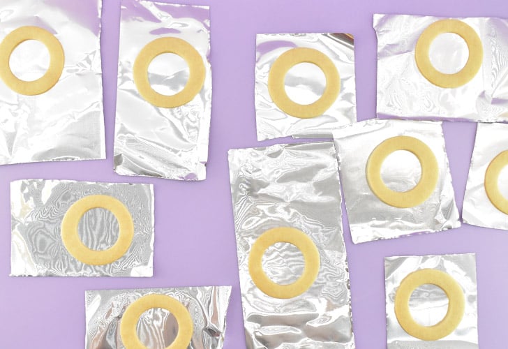 Wearing your disposable gloves, and while the isomalt is still and not bubbling, gently pour into the centers of the cookies taking care not to overfill. Allow the isomalt time to set, about 5-10 minutes. Leave the cookies on the foil until you're ready to build your cookies.