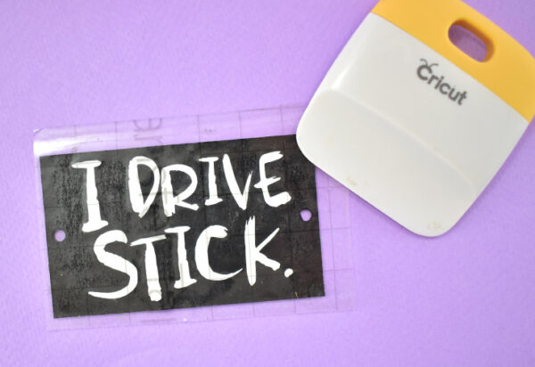 How fun is this DIY broom parking sign complete with parked brooms? Get the free cut files to make your own witch parking + tutorial!