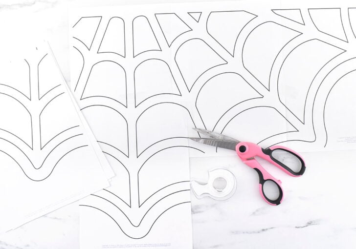 print the letter-sized PDF and print pages 2-11 at home in black and white. (Don't print the first page, it's just a photo, link the the project, and quick recap of these directions and will use up ink unnecessarily.) Trim the pages so that there are no margins. The pages will overlap to create a full-sized pattern.