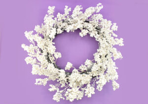 With matte berries instead of something slick and shiny this wreath is perfect to make this the quickest Halloween craft!