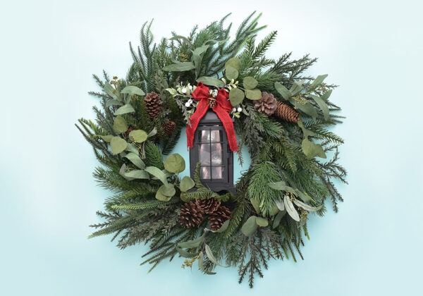 My inspiration wreath had a big red bow at the top of the wreath, but the lantern I purchased from Michael's