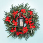 Inspired by a $229 beauty, this DIY Christmas lantern wreath cost us only $55 but has all of the gorgeous holiday charm!