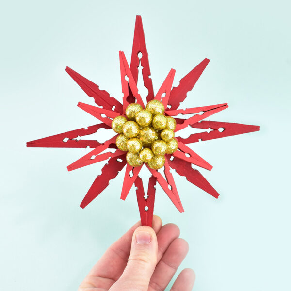 Looking for a fun & inexpensive craft for the holidays perfect for kids and adults? Make these clothespin poinsettias with our full tutorial!