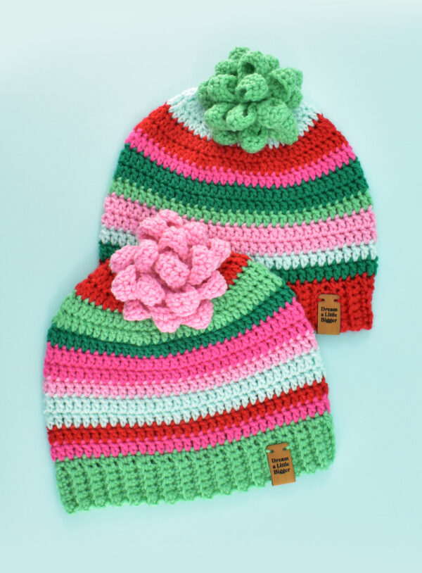 Make a simple crochet gift bow great for hats or gifts. This stash-busting beginner friendly crochet project only takes about an hour!