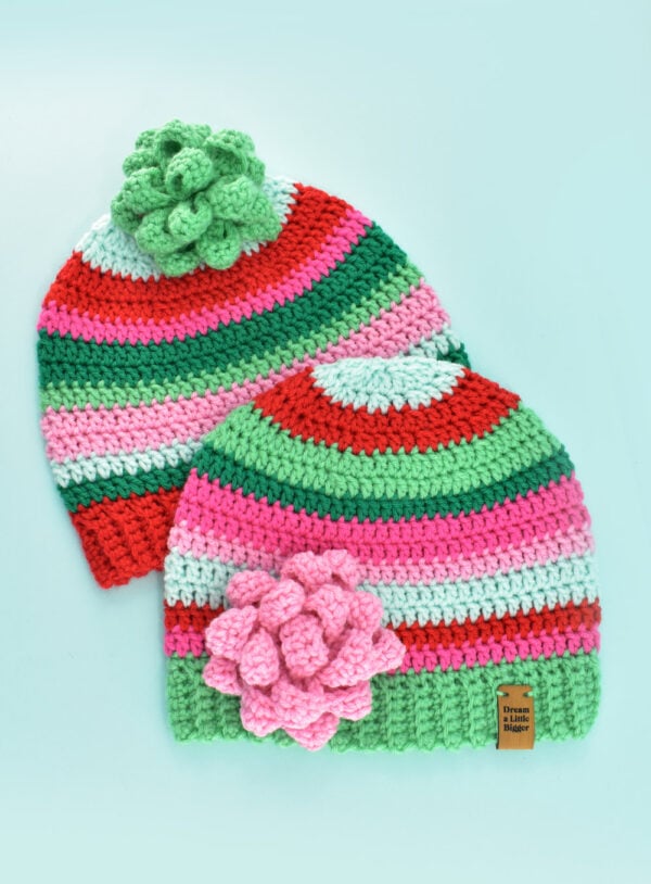 Make a simple crochet gift bow great for hats or gifts. This stash-busting beginner friendly crochet project only takes about an hour!