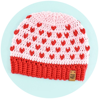 Are you looking to  hook an adorable hat? This fitted Crochet Hearts Beanie is the cutest and easy enough for beginners!