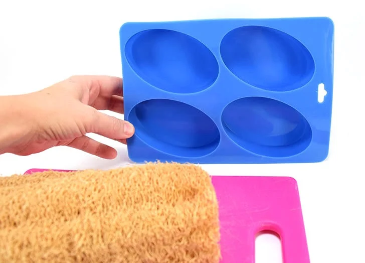 Learn how to make homemade soap, adding loofah to the mix for the perfect exfoliant. Perfect for even a first-time soap maker, these loofah soap bars are super simple and make great gifts!